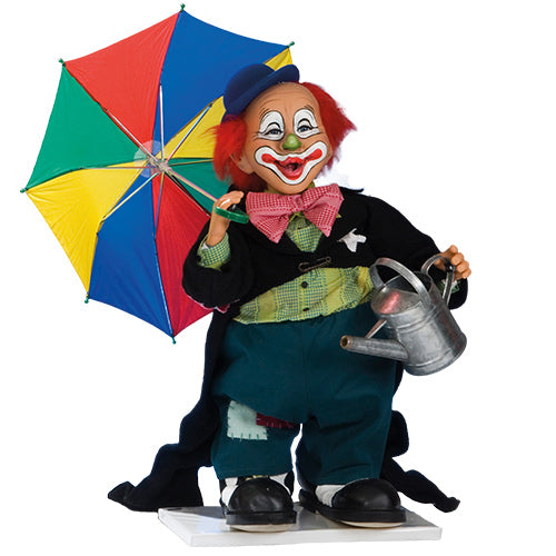 Clown with umbrella and watering can.